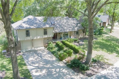 Spacious 4 bedroom, 4.5 bath side-to-side split located in a on Leawood South Country Club in Kansas - for sale on GolfHomes.com, golf home, golf lot