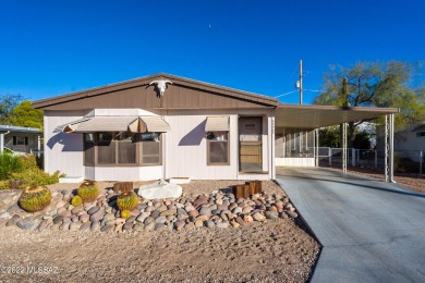 Bright and open 2BD, 2 BA double wide home within Tucson Estates on Tucson Estates Golf Course in Arizona - for sale on GolfHomes.com, golf home, golf lot