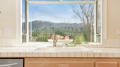 Enjoy panoramic hillside and mountain views from the kitchen on Dove Canyon Country Club in California - for sale on GolfHomes.com, golf home, golf lot