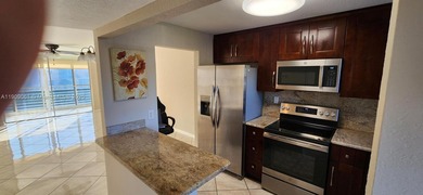 Turnkey, Just Painted 2 bed 2 bath 2 walk-ins double pantry 2 on Sunrise Lakes Phase IV Golf Course in Florida - for sale on GolfHomes.com, golf home, golf lot