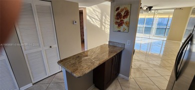 Turnkey, Just Painted 2 bed 2 bath 2 walk-ins double pantry 2 on Sunrise Lakes Phase IV Golf Course in Florida - for sale on GolfHomes.com, golf home, golf lot