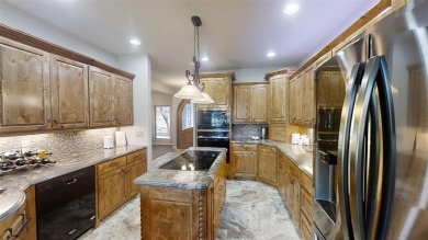 This stunning home, located in the heart of the Hideout Golf on Hideout Golf Club and Resort  in Texas - for sale on GolfHomes.com, golf home, golf lot