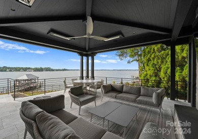 Experience unrivaled luxury in this meticulously crafted on The Peninsula Club in North Carolina - for sale on GolfHomes.com, golf home, golf lot