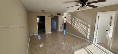 Turnkey, Just Painted 2 bed 2 bath 2 walk-ins double pantry 2 on Sunrise Lakes Phase IV Golf Course in Florida - for sale on GolfHomes.com, golf home, golf lot