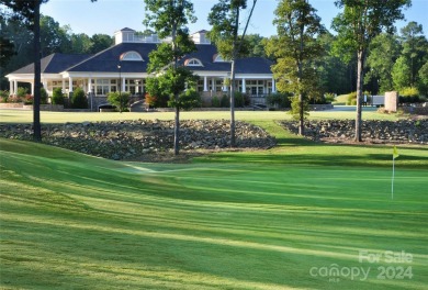 This exceptional waterfront property on Lake Tillery offers on The Tillery Tradition Country Club in North Carolina - for sale on GolfHomes.com, golf home, golf lot