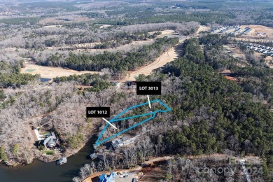 This exceptional waterfront property on Lake Tillery offers on The Tillery Tradition Country Club in North Carolina - for sale on GolfHomes.com, golf home, golf lot