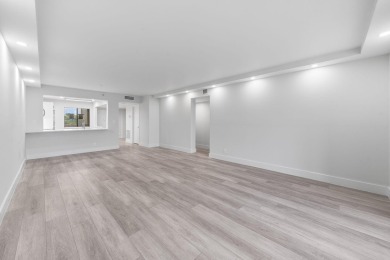 Step into luxury in this fully remodeled 2-bed, 2-bath corner on Marina Lakes Golf Course in Florida - for sale on GolfHomes.com, golf home, golf lot