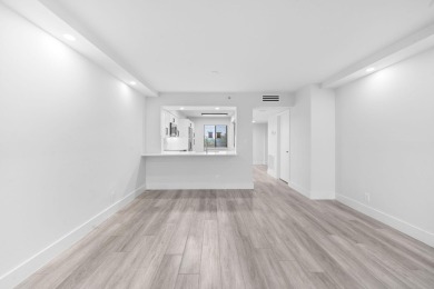 Step into luxury in this fully remodeled 2-bed, 2-bath corner on Marina Lakes Golf Course in Florida - for sale on GolfHomes.com, golf home, golf lot