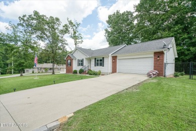 Adorable, well maintained home on a corner lot in quiet part of on Lake Tansi Village Country Club in Tennessee - for sale on GolfHomes.com, golf home, golf lot