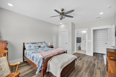 Welcome to this beautifully designed 3-bedroom, 3-bathroom on Crow Creek Golf Club in North Carolina - for sale on GolfHomes.com, golf home, golf lot