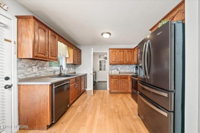 Adorable, well maintained home on a corner lot in quiet part of on Lake Tansi Village Country Club in Tennessee - for sale on GolfHomes.com, golf home, golf lot