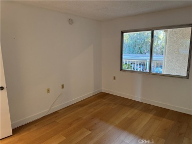 OUTSTANDING VIEW of the Saddleback Mountain, City Lights, and on Leisure Village Par 3 Golf Course in California - for sale on GolfHomes.com, golf home, golf lot