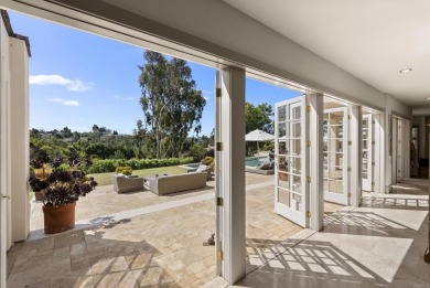 Behind private gates in the heart of the Rancho Santa Fe on Rancho Santa Fe Golf Club in California - for sale on GolfHomes.com, golf home, golf lot