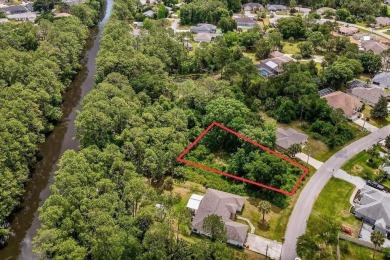 Don't miss this opportunity to own a prime lot in the desirable on The Grand Club - Pine Lakes Course in Florida - for sale on GolfHomes.com, golf home, golf lot