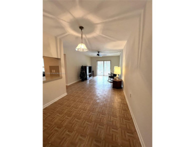 Experience this freshly painted 2-bed, 1-bath condo in a on Palmetto Golf Course in Florida - for sale on GolfHomes.com, golf home, golf lot