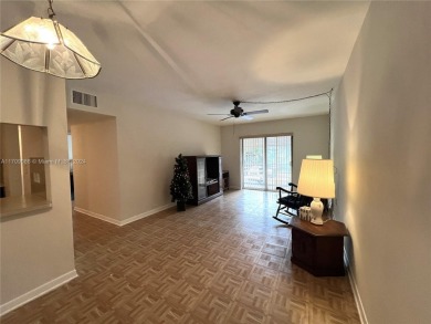 Experience this freshly painted 2-bed, 1-bath condo in a on Palmetto Golf Course in Florida - for sale on GolfHomes.com, golf home, golf lot