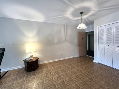 Experience this freshly painted 2-bed, 1-bath condo in a on Palmetto Golf Course in Florida - for sale on GolfHomes.com, golf home, golf lot