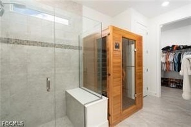 This popular 3-bedroom + den/home office floor plan with a 2-car on Babcock National Golf Course in Florida - for sale on GolfHomes.com, golf home, golf lot