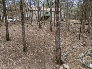 In a quiet area of Holiday Island, This home Sits on 2 lots, is on Holiday Island Executive Golf Course in Arkansas - for sale on GolfHomes.com, golf home, golf lot