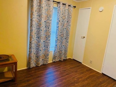 This home is in a 55 plus community with a monthly lot rent of on Crystal Lake Club in Florida - for sale on GolfHomes.com, golf home, golf lot