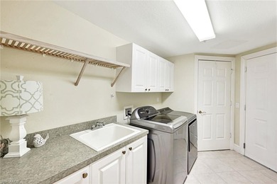 Beautifully appointed first-floor coach home in the double-gated on The Rookery At Marco in Florida - for sale on GolfHomes.com, golf home, golf lot