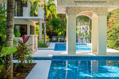 The villa consists of a main house and guesthouse, and is built on Bahia Principe Riviera Maya Golf Course in  - for sale on GolfHomes.com, golf home, golf lot