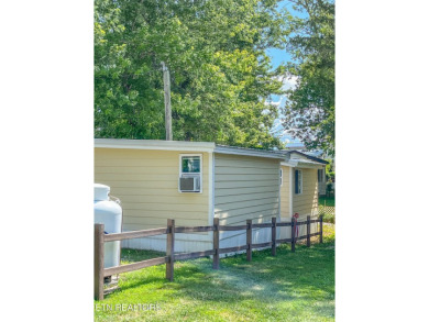 Charming 1 Bedroom Retreat in Holiday Out RV Park on creek with on Lake Tansi Village Country Club in Tennessee - for sale on GolfHomes.com, golf home, golf lot