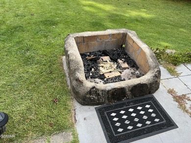 Nice RV lot with plenty of trees, nice patio, and firepit area on Bent Creek Golf Course in Tennessee - for sale on GolfHomes.com, golf home, golf lot