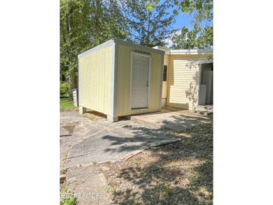 Charming 1 Bedroom Retreat in Holiday Out RV Park on creek with on Lake Tansi Village Country Club in Tennessee - for sale on GolfHomes.com, golf home, golf lot