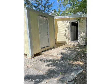 Charming 1 Bedroom Retreat in Holiday Out RV Park on creek with on Lake Tansi Village Country Club in Tennessee - for sale on GolfHomes.com, golf home, golf lot