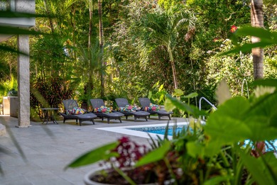 The villa consists of a main house and guesthouse, and is built on Bahia Principe Riviera Maya Golf Course in  - for sale on GolfHomes.com, golf home, golf lot