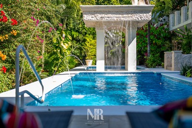 The villa consists of a main house and guesthouse, and is built on Bahia Principe Riviera Maya Golf Course in  - for sale on GolfHomes.com, golf home, golf lot