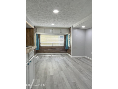 Charming 1 Bedroom Retreat in Holiday Out RV Park on creek with on Lake Tansi Village Country Club in Tennessee - for sale on GolfHomes.com, golf home, golf lot
