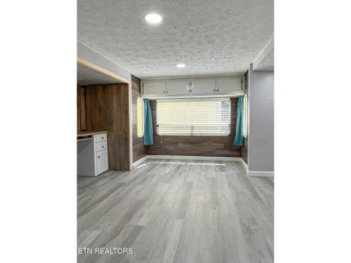 Charming 1 Bedroom Retreat in Holiday Out RV Park on creek with on Lake Tansi Village Country Club in Tennessee - for sale on GolfHomes.com, golf home, golf lot