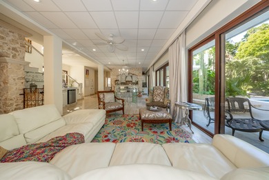 The villa consists of a main house and guesthouse, and is built on Bahia Principe Riviera Maya Golf Course in  - for sale on GolfHomes.com, golf home, golf lot