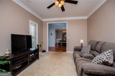 Move-in ready with BRAND NEW CARPET, this spacious 4-bedroom, 2 on Creekside Golf and Country Club in Georgia - for sale on GolfHomes.com, golf home, golf lot