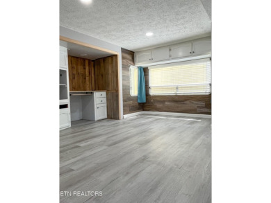 Charming 1 Bedroom Retreat in Holiday Out RV Park on creek with on Lake Tansi Village Country Club in Tennessee - for sale on GolfHomes.com, golf home, golf lot