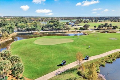Beautifully appointed first-floor coach home in the double-gated on The Rookery At Marco in Florida - for sale on GolfHomes.com, golf home, golf lot