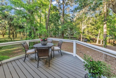 Nestled under a canopy of centuries old Angel Live Oak trees on Willbrook Plantation Golf Club in South Carolina - for sale on GolfHomes.com, golf home, golf lot