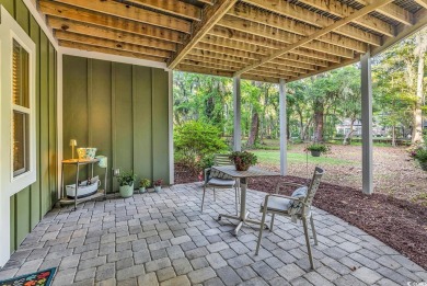 Nestled under a canopy of centuries old Angel Live Oak trees on Willbrook Plantation Golf Club in South Carolina - for sale on GolfHomes.com, golf home, golf lot