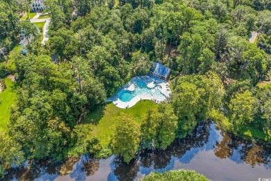 Nestled under a canopy of centuries old Angel Live Oak trees on Willbrook Plantation Golf Club in South Carolina - for sale on GolfHomes.com, golf home, golf lot