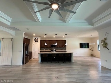 All Impact Windows, custom pool home is on a corner lot with a on Gateway Golf and Country Club in Florida - for sale on GolfHomes.com, golf home, golf lot