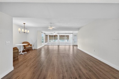 Presenting this custom-built residence overlooking the tranquil on North Lakes Golf Course in Florida - for sale on GolfHomes.com, golf home, golf lot