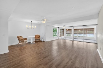 Presenting this custom-built residence overlooking the tranquil on North Lakes Golf Course in Florida - for sale on GolfHomes.com, golf home, golf lot