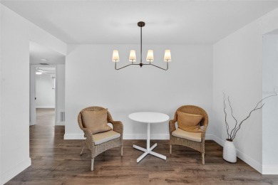 Presenting this custom-built residence overlooking the tranquil on North Lakes Golf Course in Florida - for sale on GolfHomes.com, golf home, golf lot
