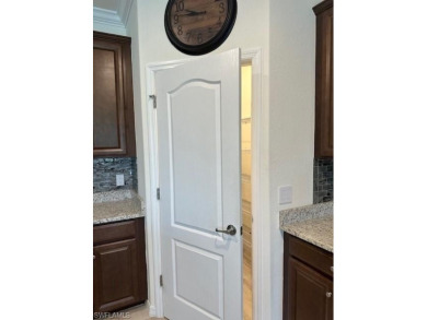 All Impact Windows, custom pool home is on a corner lot with a on Gateway Golf and Country Club in Florida - for sale on GolfHomes.com, golf home, golf lot