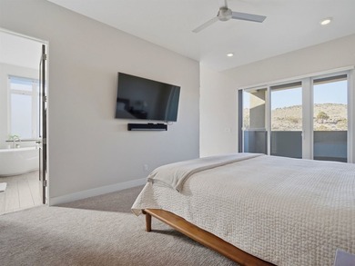 ROOFTOP PATIO, MONUMENT VIEWS...WOW!! Discover the unparalleled on The Golf Club At Redlands Mesa in Colorado - for sale on GolfHomes.com, golf home, golf lot