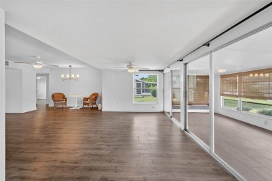 Presenting this custom-built residence overlooking the tranquil on North Lakes Golf Course in Florida - for sale on GolfHomes.com, golf home, golf lot