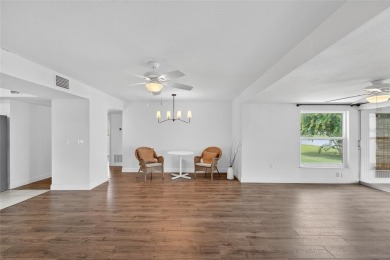 Presenting this custom-built residence overlooking the tranquil on North Lakes Golf Course in Florida - for sale on GolfHomes.com, golf home, golf lot