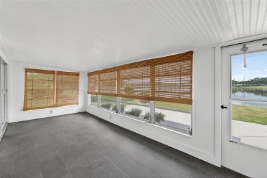 Presenting this custom-built residence overlooking the tranquil on North Lakes Golf Course in Florida - for sale on GolfHomes.com, golf home, golf lot